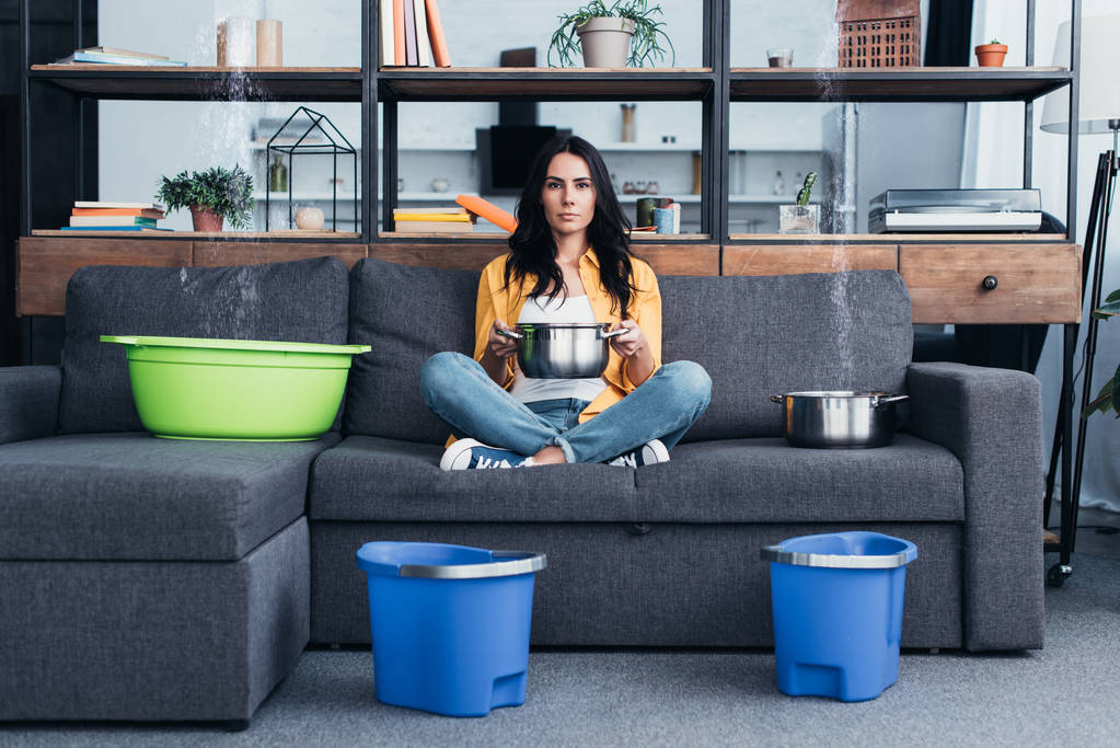 stock-photo-beautiful-woman-pots-buckets-dealing